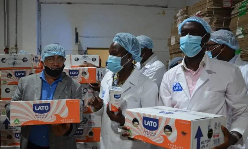 Lato officials at the factory's plant in Uganda. Image: BDA.